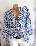 Damen nan locker geschnittene Tunika-Bluse mit Ikat‑Muster, V‑Ausschnitt und Dreiviertelärmeln Shopnory
