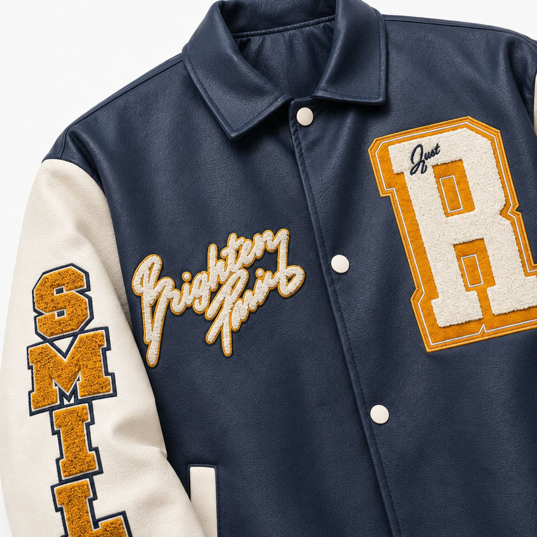 Herren Collegejacke im Letterman‑Stil mit Kunstleder‑Body, Kontrastärmeln und Chenille‑Patches Shop Nory