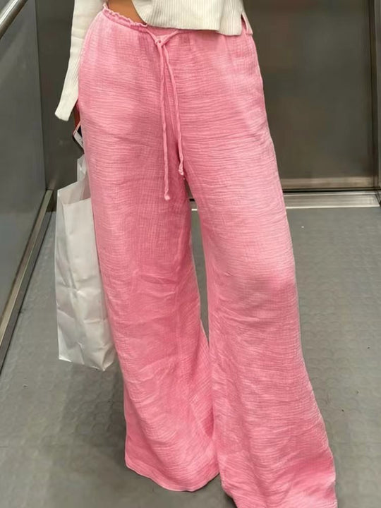 Damen Leinenhose mit lockerer, knöchellanger Passform, seitlichen Eingrifftaschen und Zierknopf-Details Shop Nory