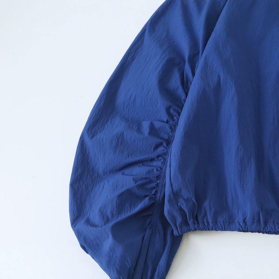 Damen Leichte Cropped-Übergangsjacke mit Stehkragen, weiten Raglanärmeln und Tunnelzug Shop Nory