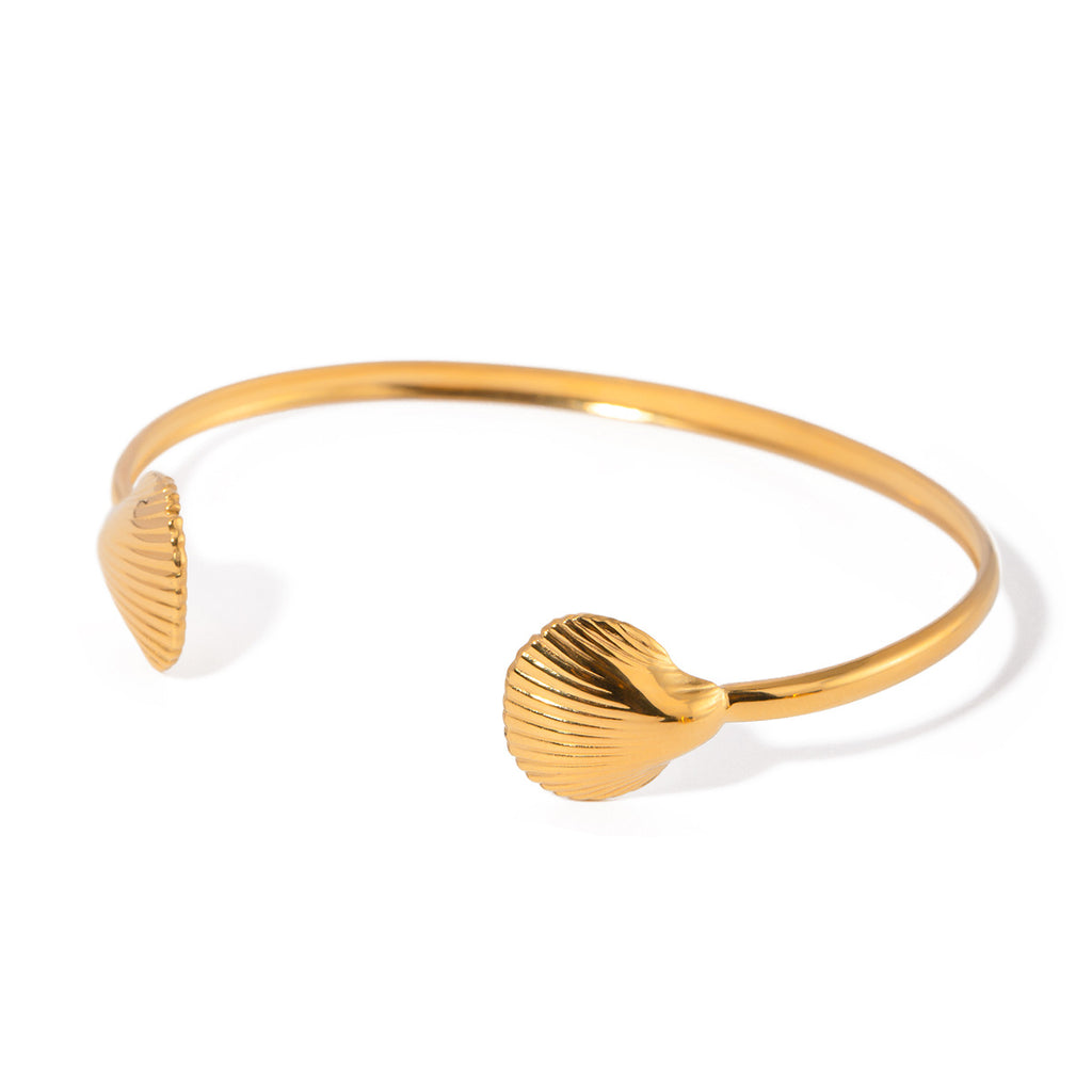 Damen Armreif mit kunstvollem Muschelmuster aus hypoallergenem Edelstahl Shop Nory