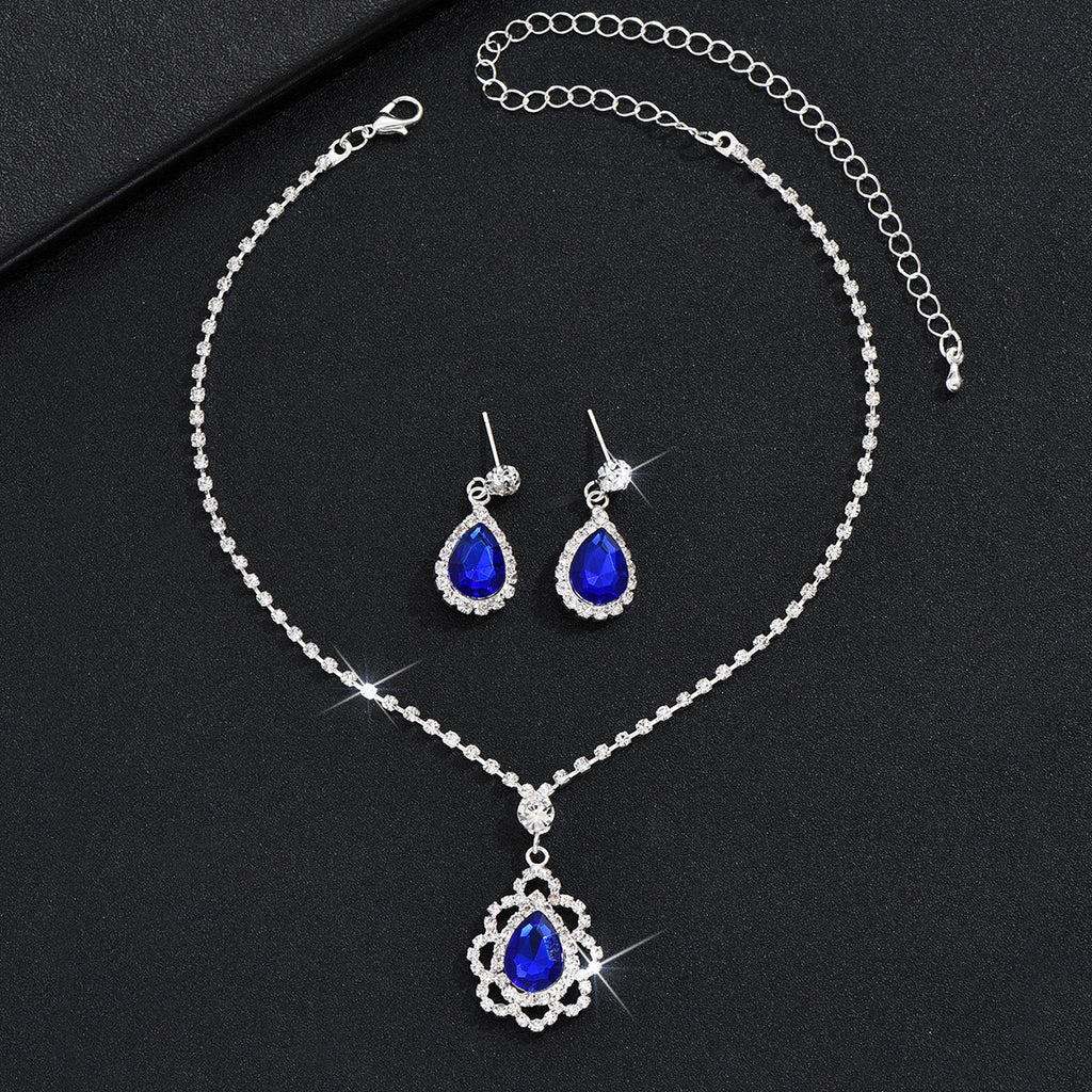 Tropfenpendant und passendes Tropfohrschmuckset für Braut mit kubischem Zirkonia-Halo