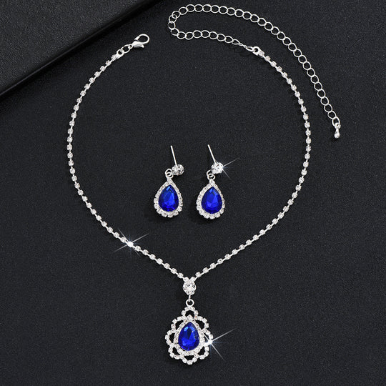 Tropfenpendant und passendes Tropfohrschmuckset für Braut mit kubischem Zirkonia-Halo
