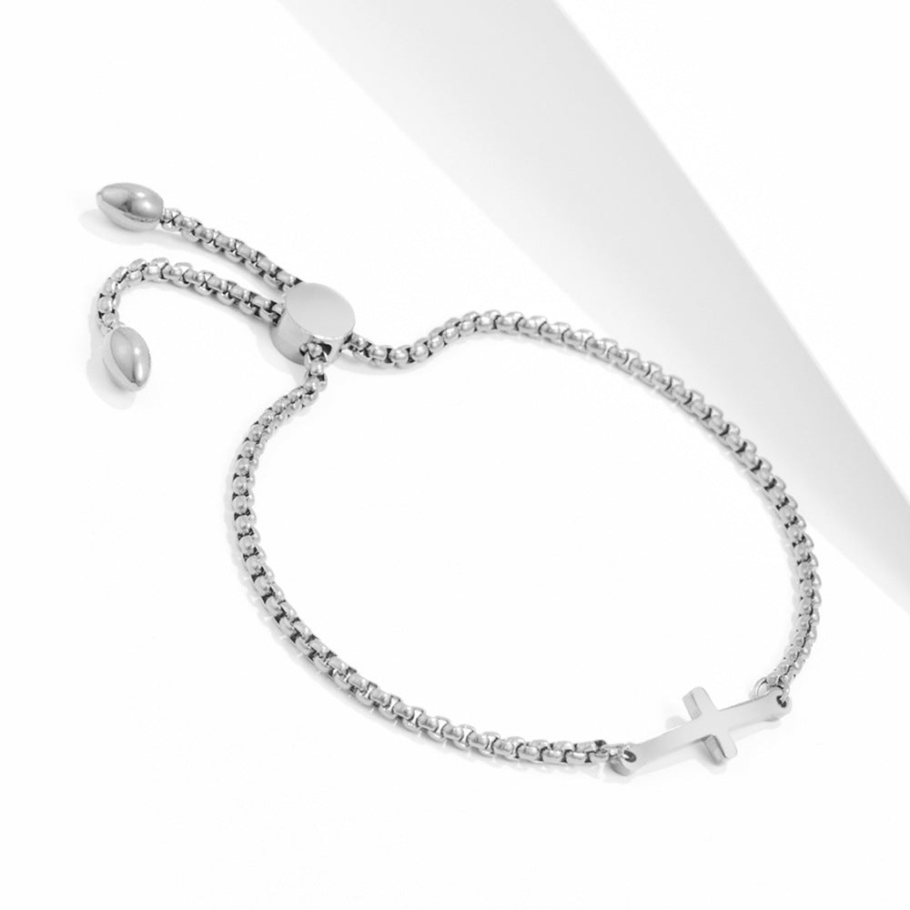 Damen Armband mit stilvollem Kreuzanhänger und verstellbarem Zugverschluss Shop Nory