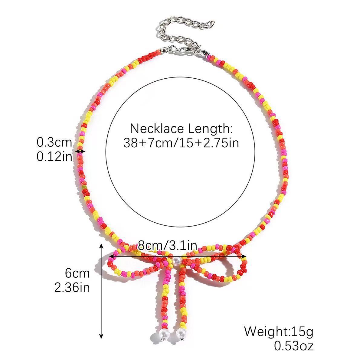 Damen Kette mit funkelndem Schleifenanhänger Shop Nory
