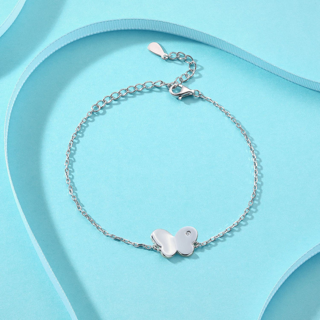 Damenarmband mit elegantem Schmetterlingsmotiv und funkelndem Stein Shop Nory