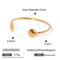 Damen Armreif mit kunstvollem Muschelmuster aus hypoallergenem Edelstahl Shop Nory
