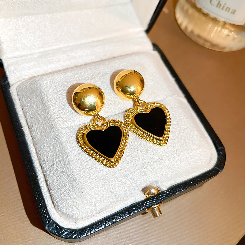 Damen Ohrringe mit elegantem Herzanhänger Shop Nory