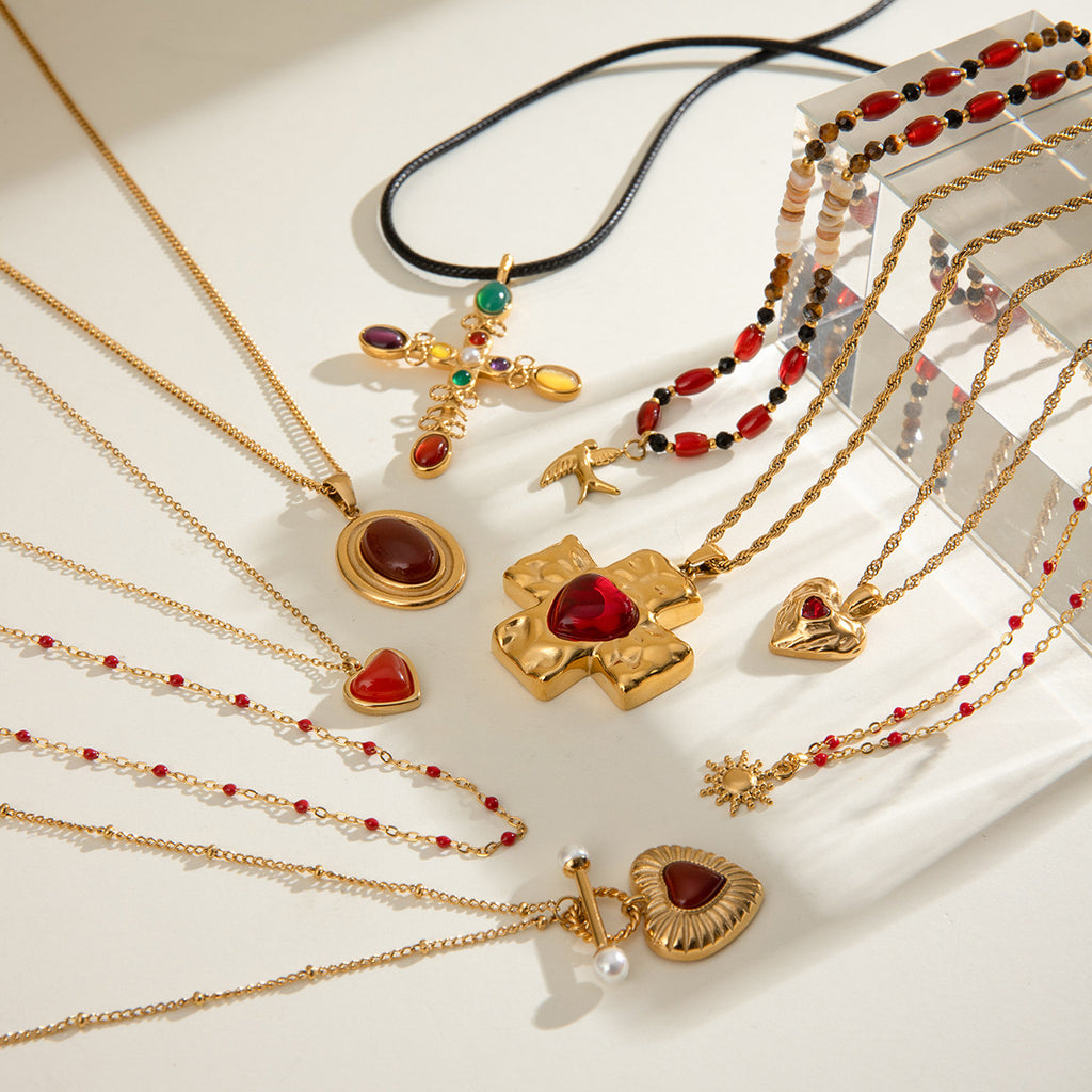 Damen Halskette mit herzförmigem Anhänger aus hypoallergenem Edelstahl und klassischem Kreuzdesign Shop Nory
