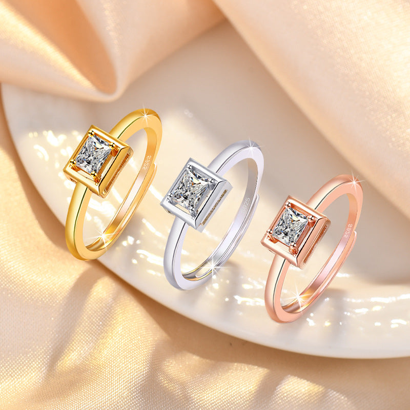 Damen eleganter Verlobungsring mit quadratischem Zirkonia-Besatz Shop Nory