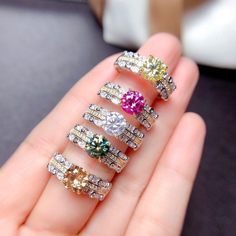 Damenring mit majestätischem, rundem Edelstein und glitzerndem Zirkonia-Besatz Shop Nory