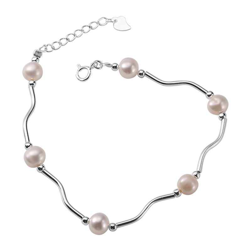 Damen Armband mit geschwungenem Lieferketten-Design und zarten Perlen Shop Nory