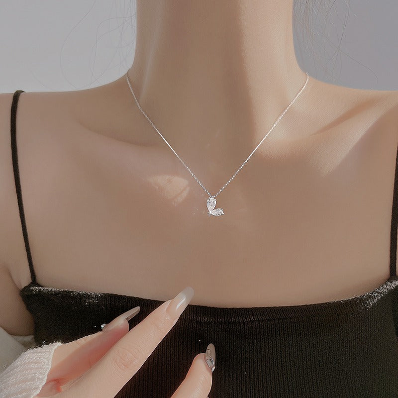 Damen zarte Halskette mit filigranem Schmetterlingsanhänger Shop Nory