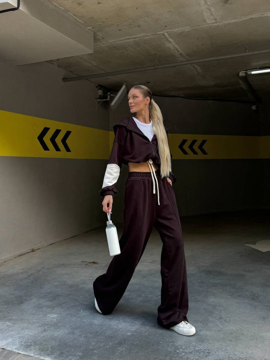 Damen weite hochgeschnittene Jogginghose mit sichtbarer Bügelfalte und Elastikbund Shop Nory