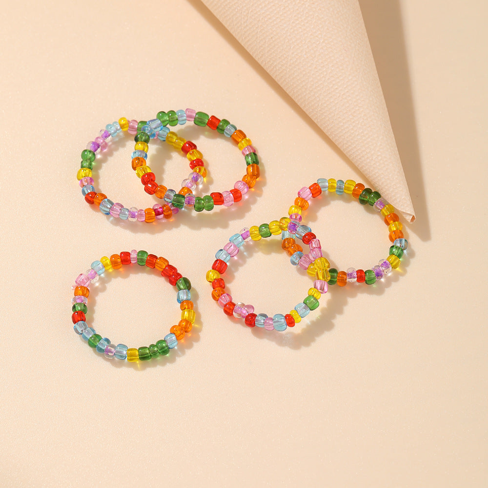 Damenarmband mit bunten und transparenten Acrylperlen Shop Nory
