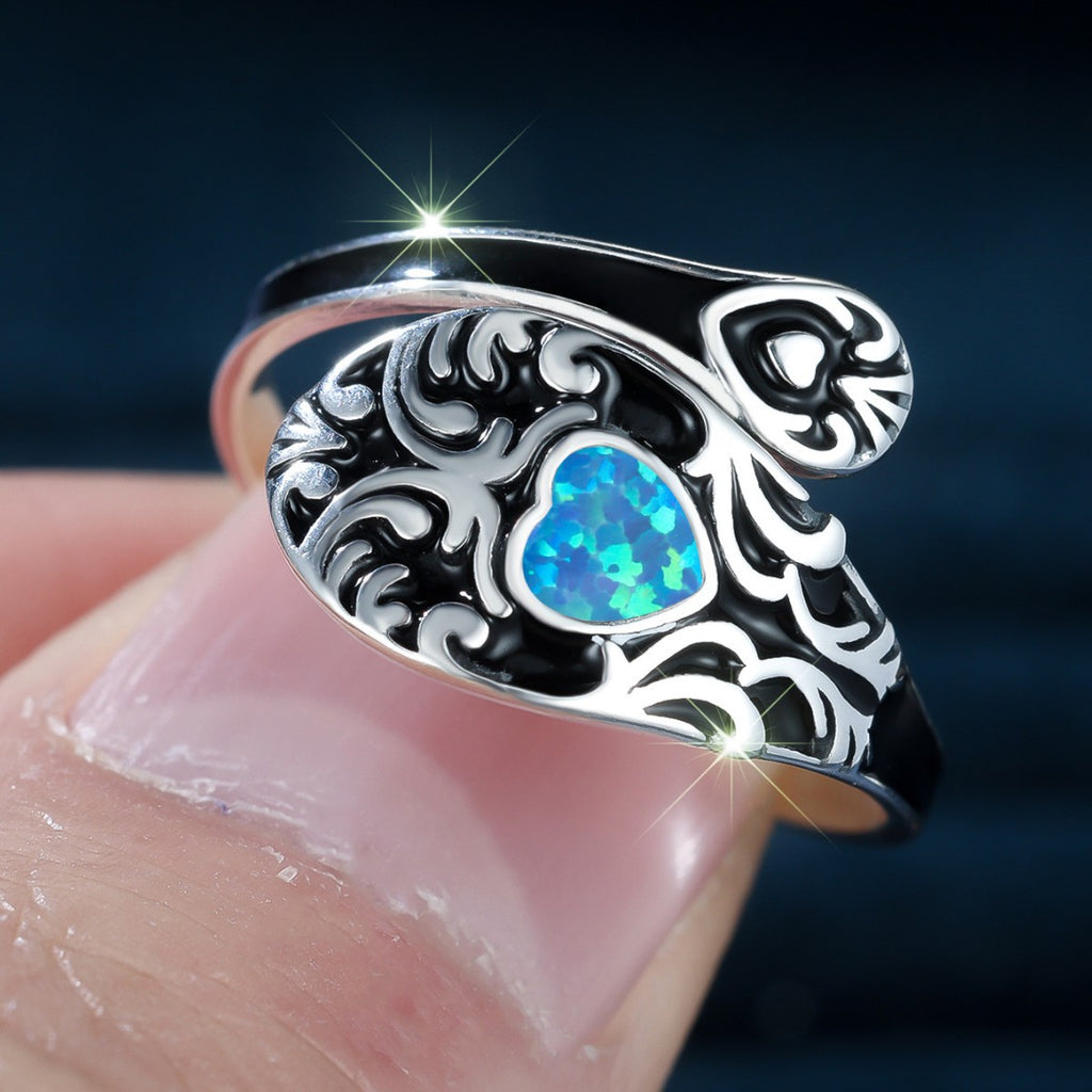 Damen Ring mit kunstvollem Design und schimmerndem Opal Shop Nory