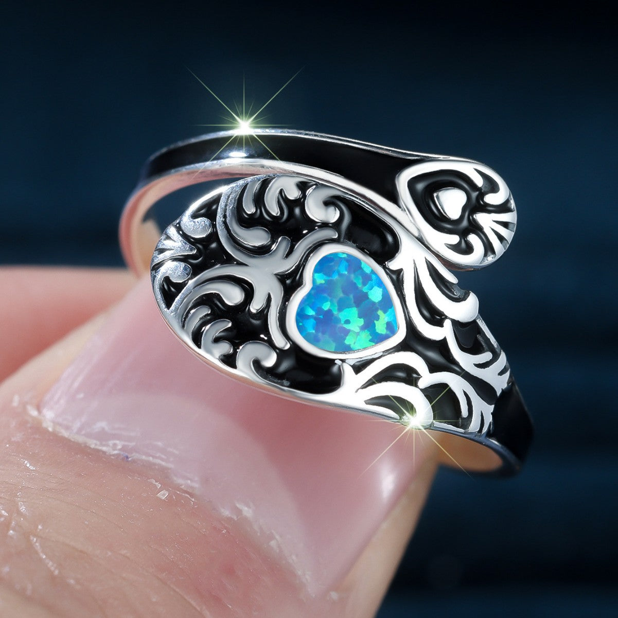 Damen Ring mit kunstvollem Design und schimmerndem Opal Shop Nory