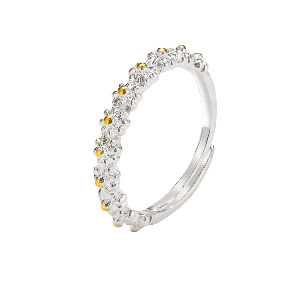 Damenring mit filigranem Blumenmuster und funkelnden Zirkonia Shop Nory