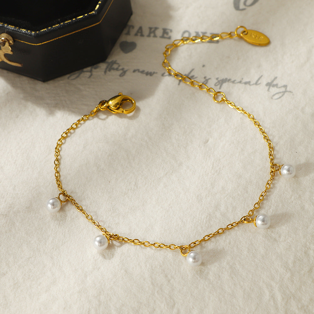 Damen zartes Perlenarmband mit goldfarbener Gliederkette Shop Nory