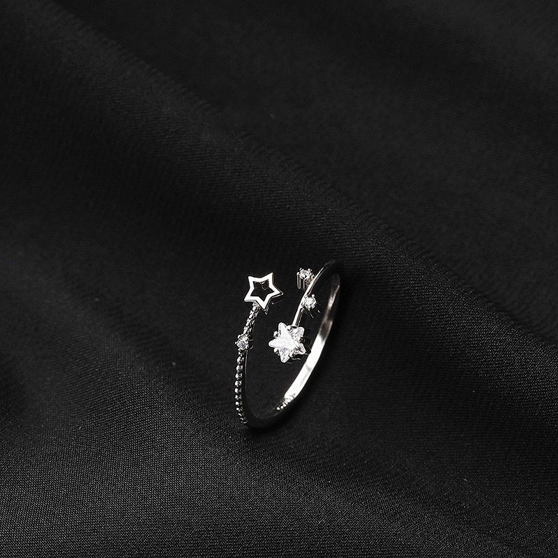 Damen eleganter und zarter Ring mit Stern- und Blütenmotiven Shop Nory