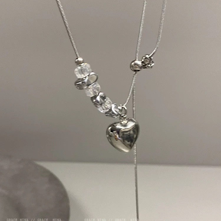 Damen Halskette mit glänzendem Herzanhänger und edlen Kristallelementen Shop Nory