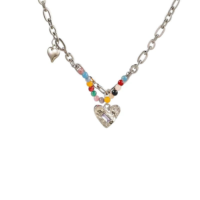 Damen Armband mit bunten Perlen und charmanten Herzanhängern Shop Nory