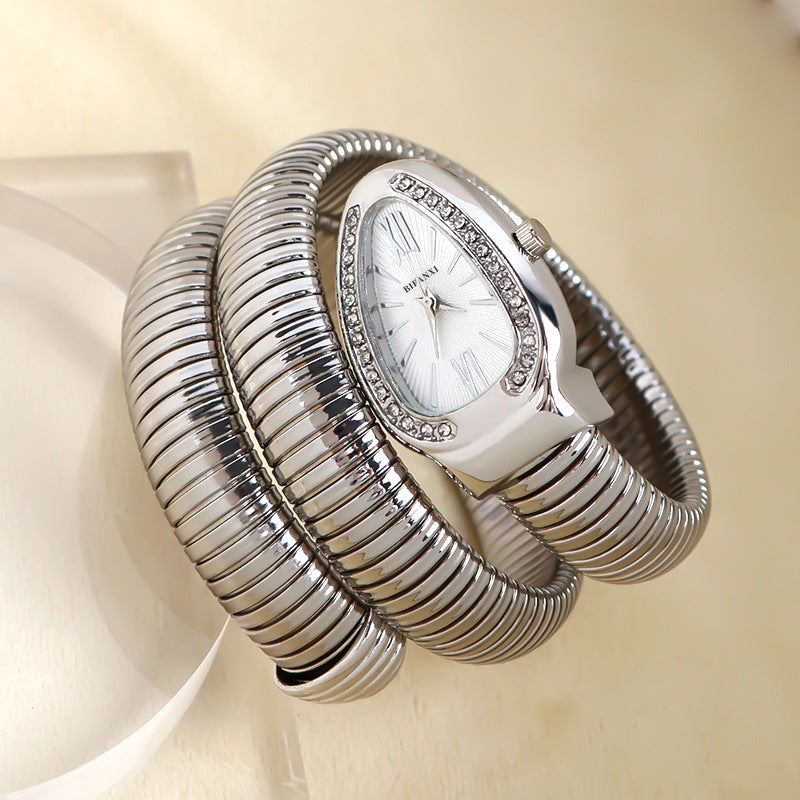 ShopNory | Schlangenuhr mit Quarzbewegung und Persönlichem Armband
