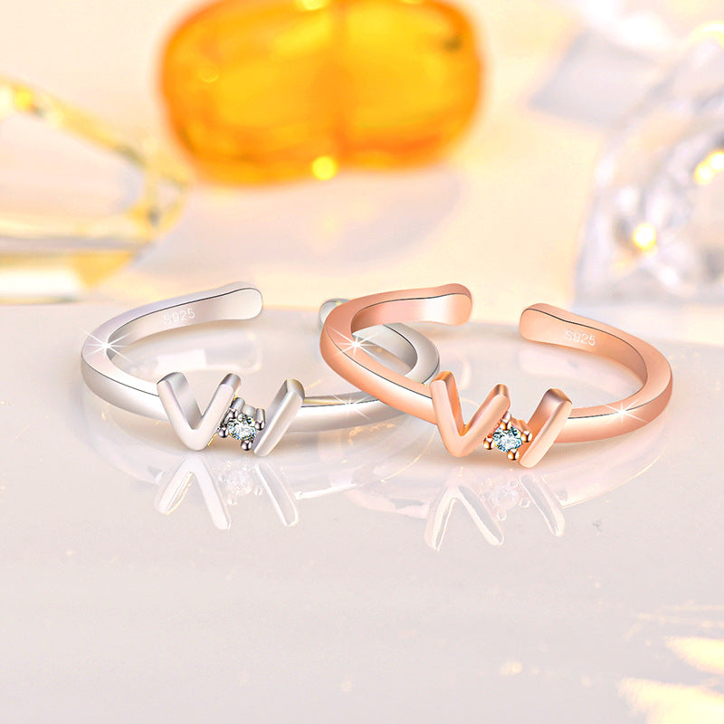 Damen Offener Ring mit geschwungenem Design und funkelndem Zirkonia-Besatz Shop Nory