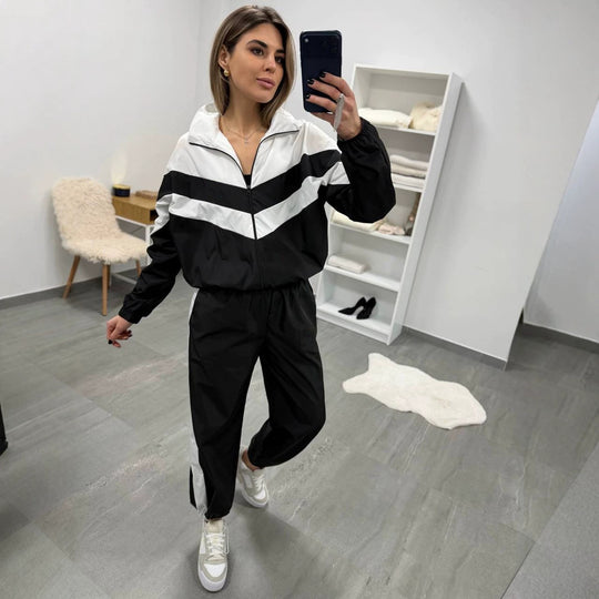 Damen retro Nylon-Trainingsanzug mit Kapuzen-Zipjacke und weiter hochgeschnittener Hose Shop Nory
