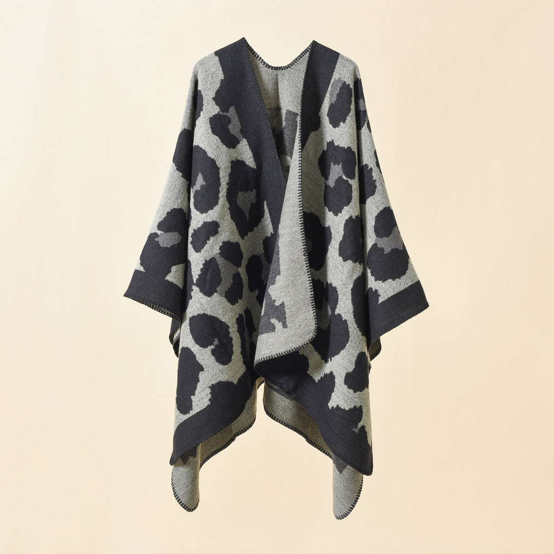 Damen Oversize-Strickruana mit grafischem Jacquard und Zierstich Shop Nory