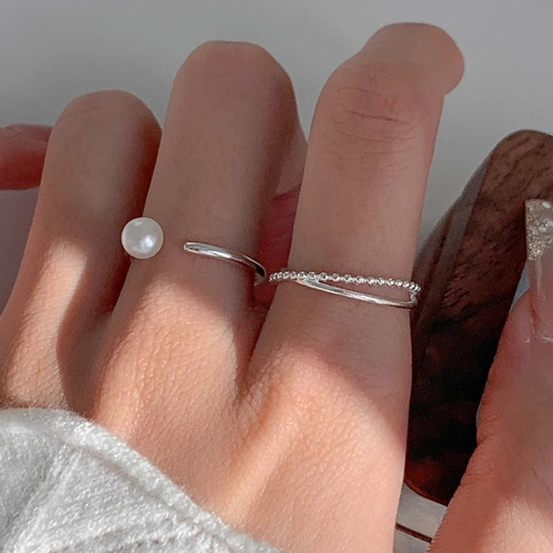 Damenring mit kunstvollem Wellen-Design und funkelnden Akzenten Shop Nory