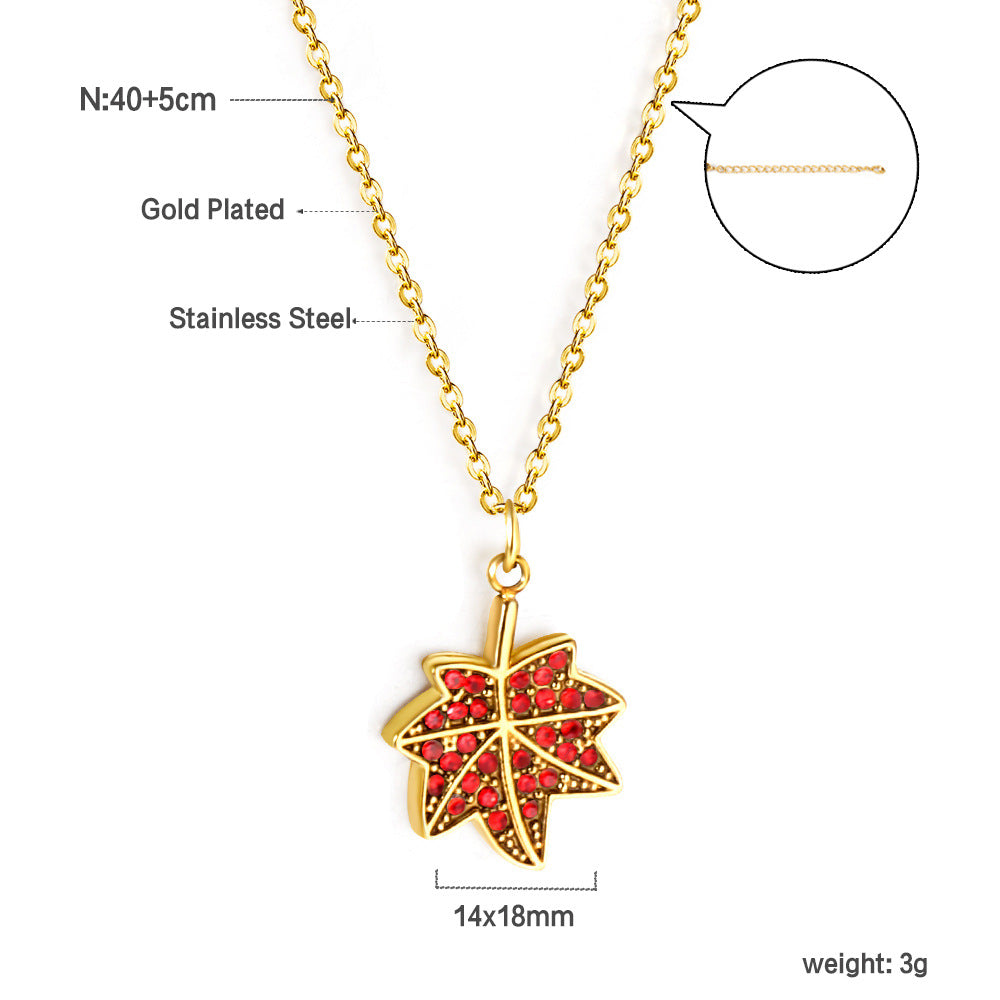 Damen Halskette mit kunstvollem Ahornblatt-Anhänger aus goldplattiertem Edelstahl und brillantem Kristallbesatz Shop Nory