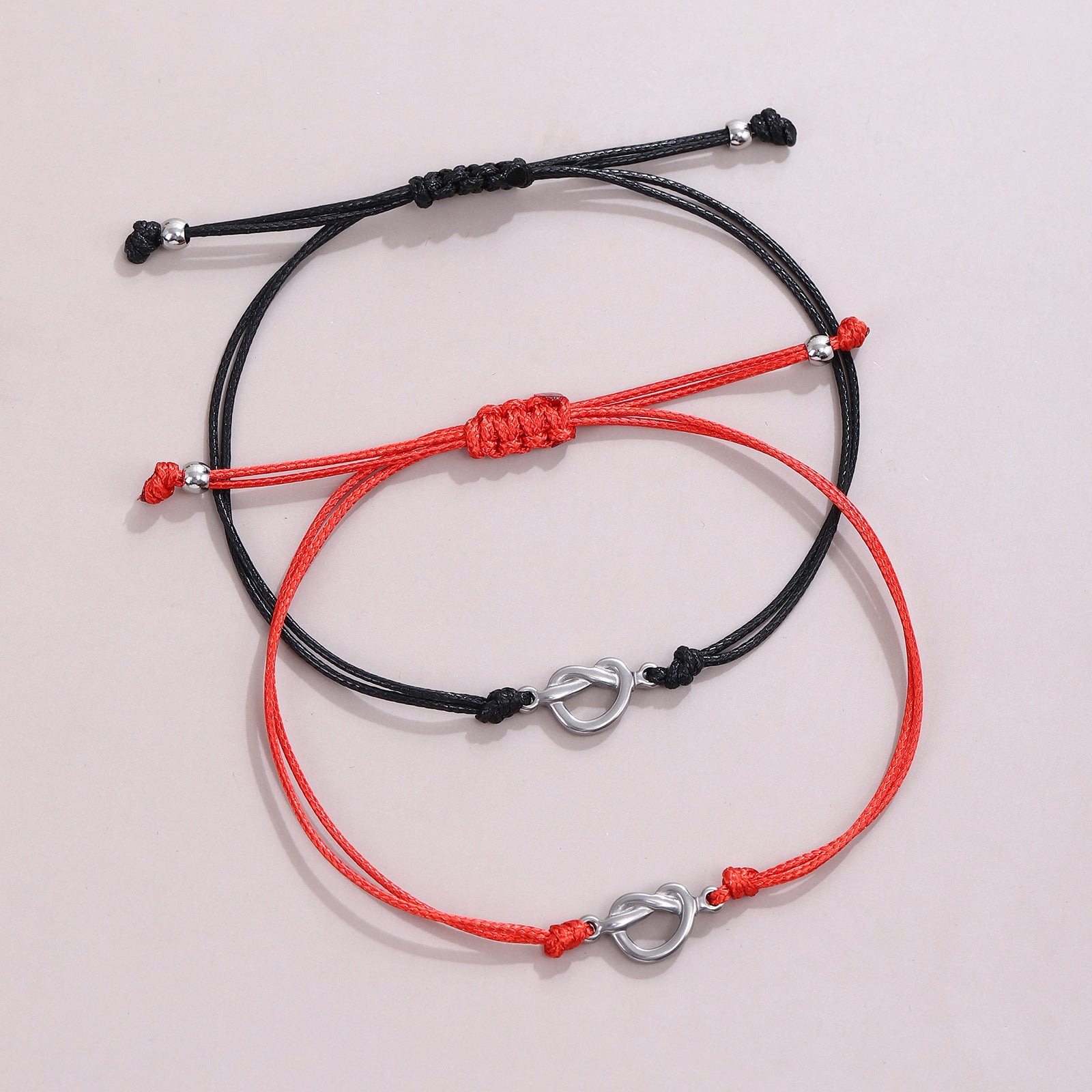 Damenarmband mit verstellbarem Knoten und Herzverschluss Shop Nory