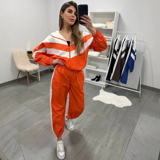 Damen retro Nylon-Trainingsanzug mit Kapuzen-Zipjacke und weiter hochgeschnittener Hose Shop Nory