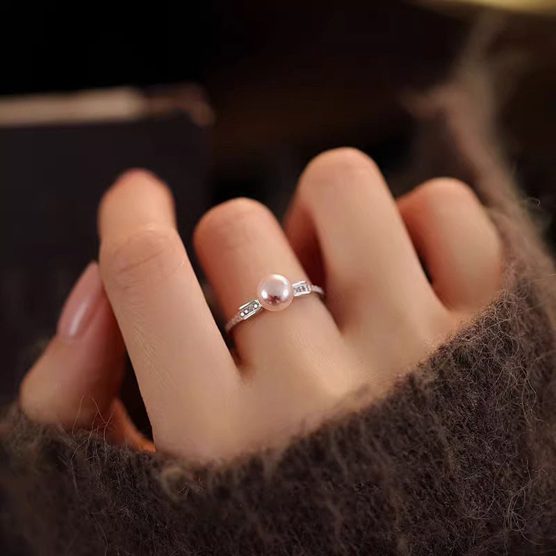 Damen zierlicher Ring mit eleganter Perle und funkelnden Zirkonia-Shop Nory