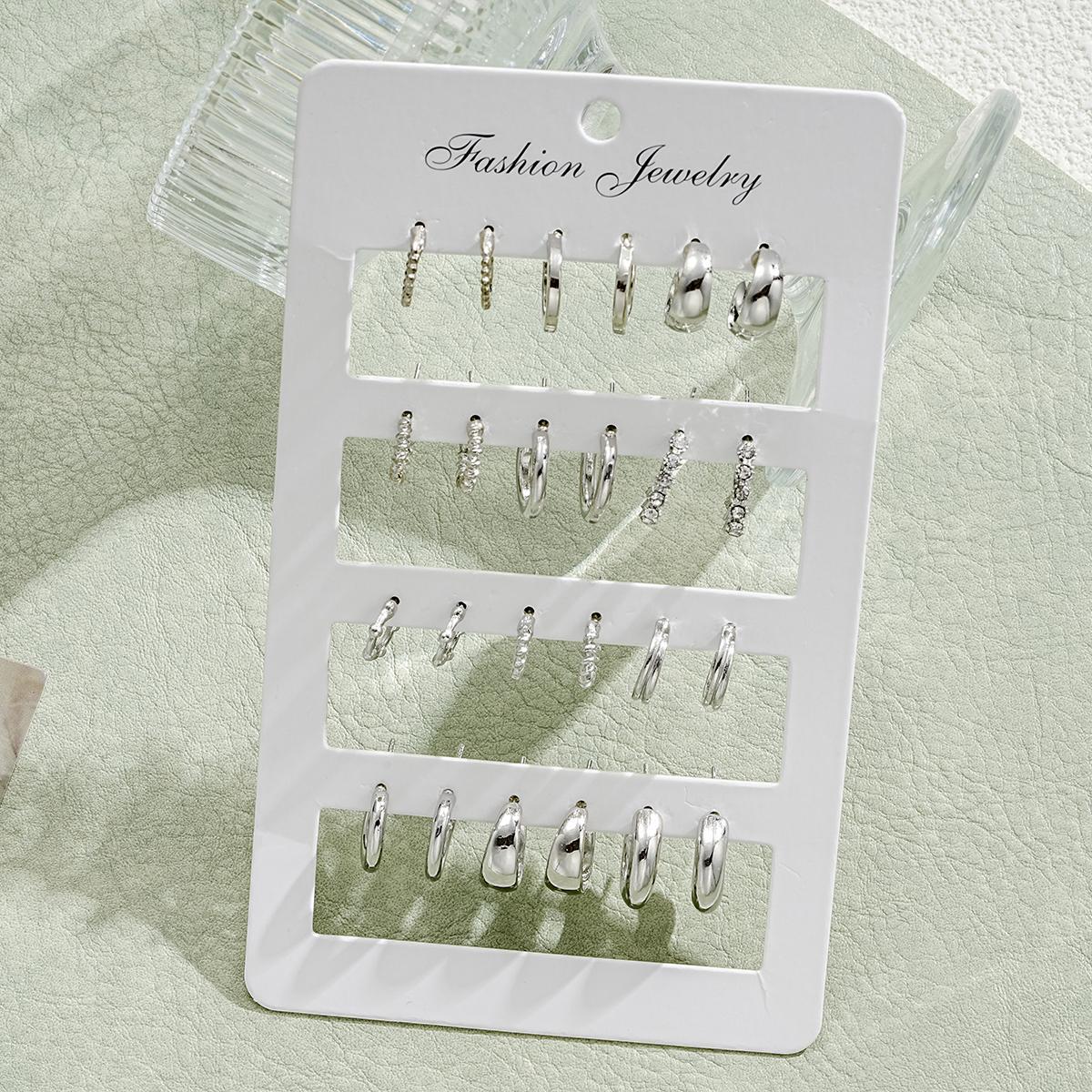 Damen Ohrstecker Set mit funkelnden Kristallen und stilvollen Designs Shop Nory