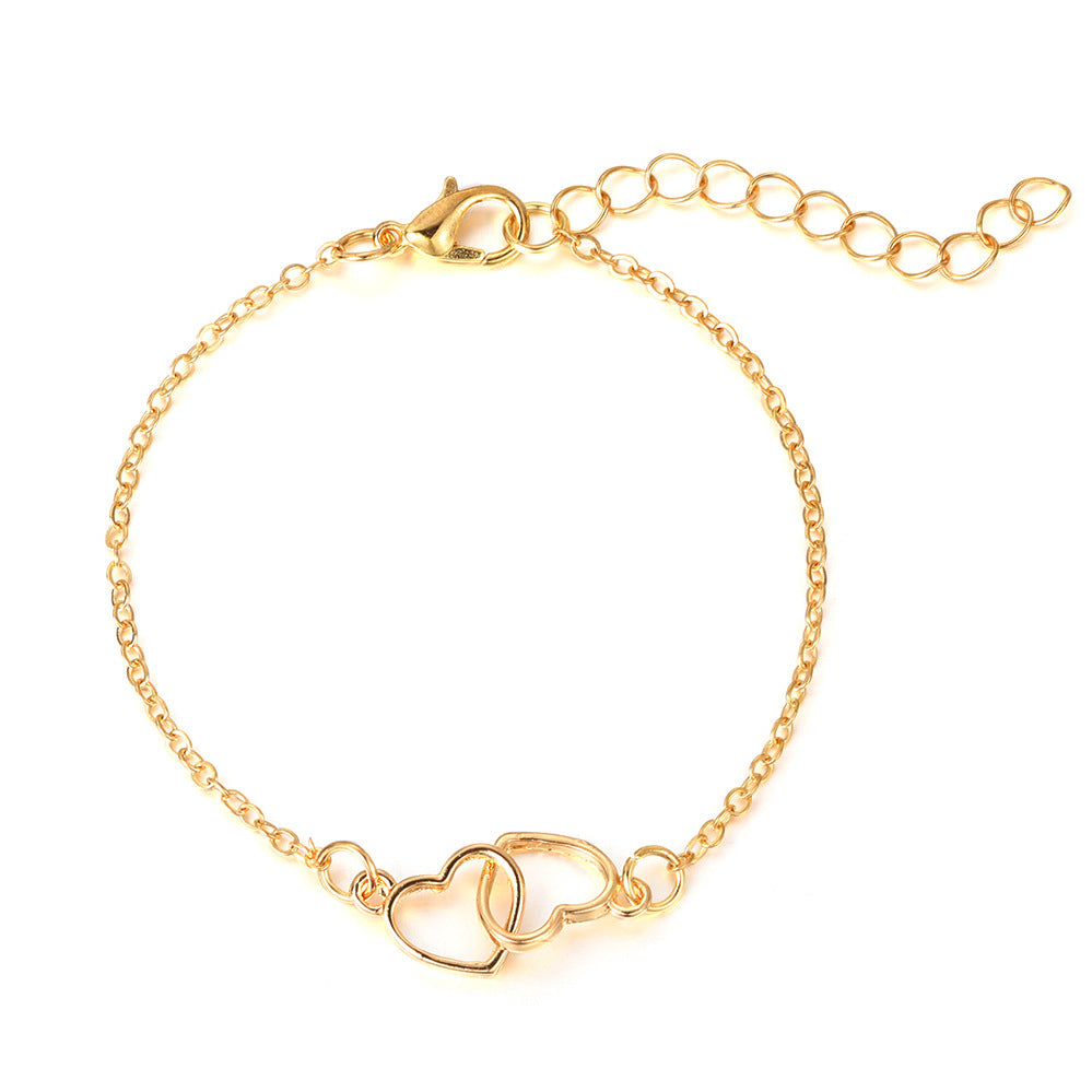 Damenarmband mit dreifachem Herzdesign Shop Nory