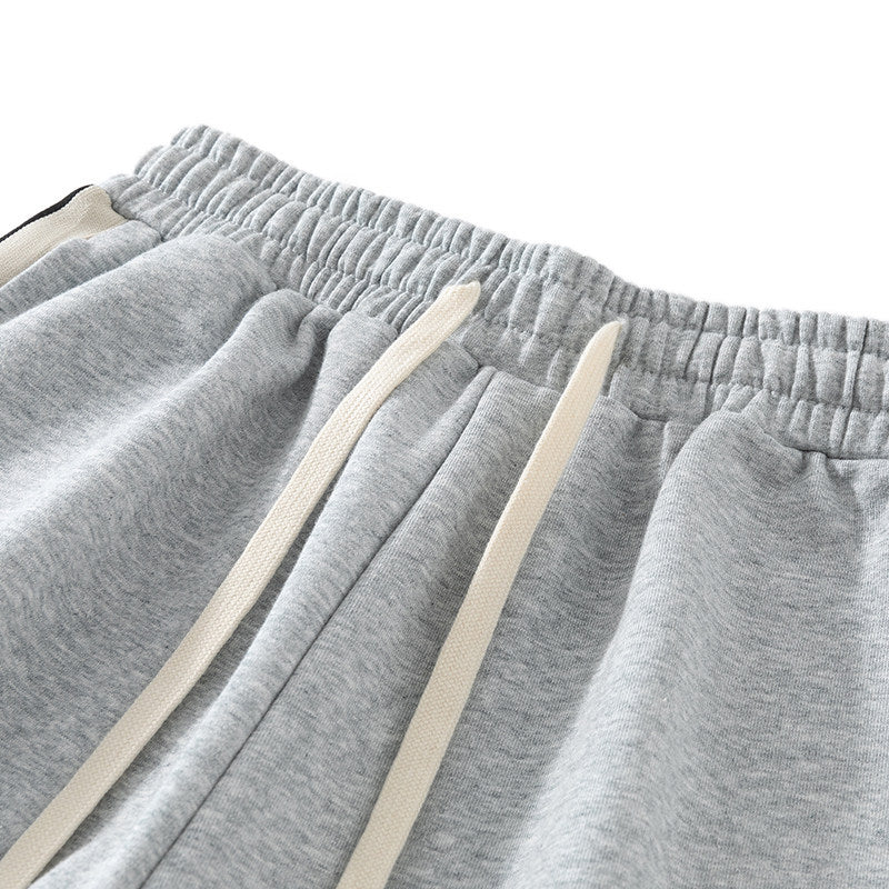 Herren Locker geschnittene Jogginghose mit elastischem Bund, Kordelzug und kontrastfarbenen Seitenstreifen Shop Nory