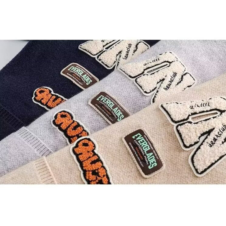 Damen Gemütliche Strickjacke mit bunten Applikationen Shop Nory