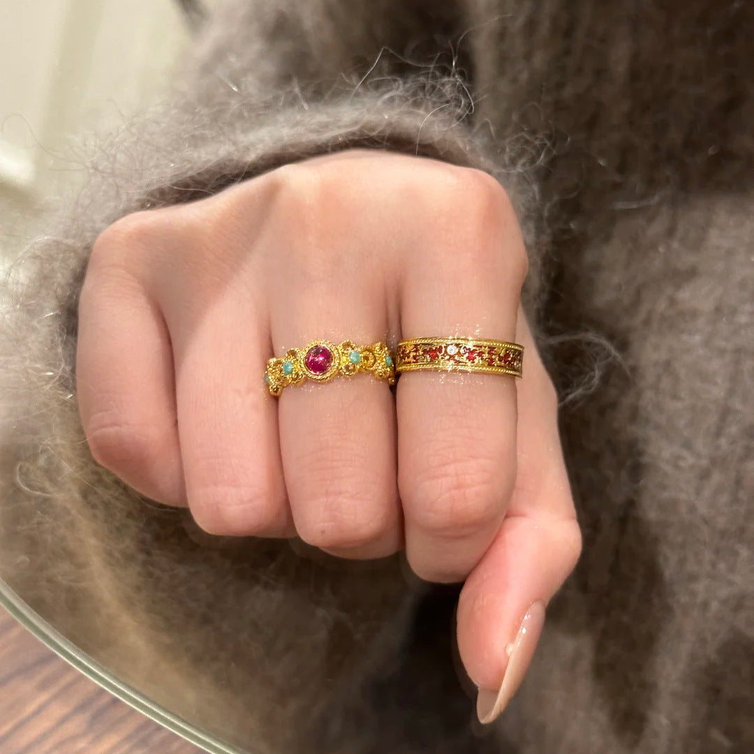 Damenring mit kunstvollem Design und buntem Edelstein Shop Nory