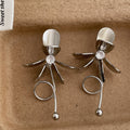 Damen Ohrschmuck im modernen Blumendesign Shop Nory