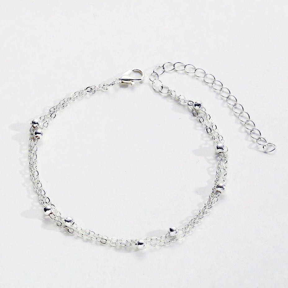 Damenarmband mit modischem Doppelketten-Design und eleganten Metallakzenten Shop Nory
