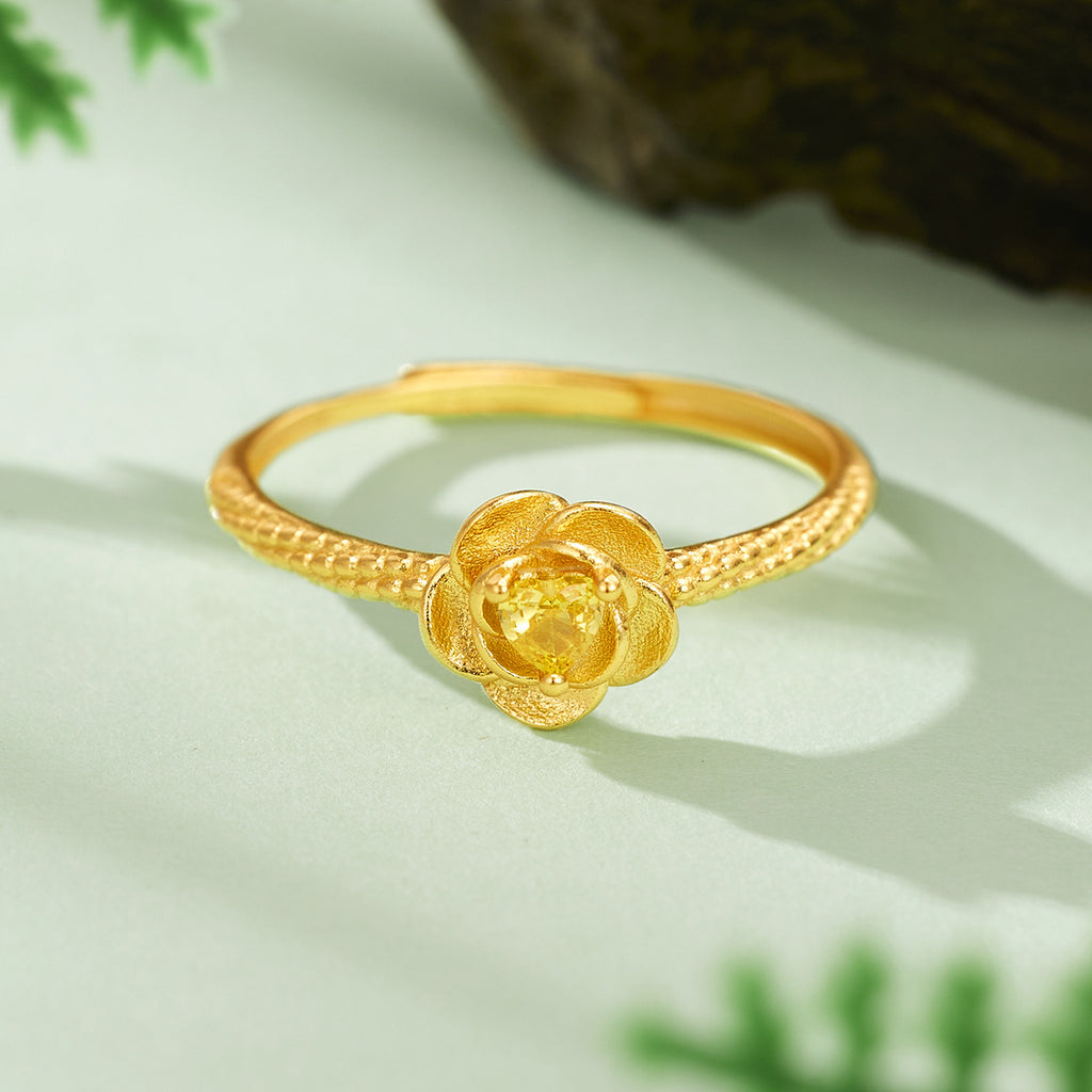 Damen Ring mit blütenförmigem Schmuckdesign und funkelndem gelbem Edelstein Shop Nory