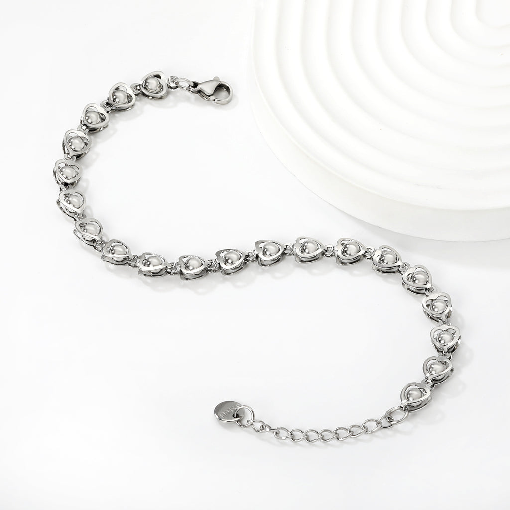 Damen Armband mit herzförmigen Anhängern und verstellbarem Verschluss Shop Nory