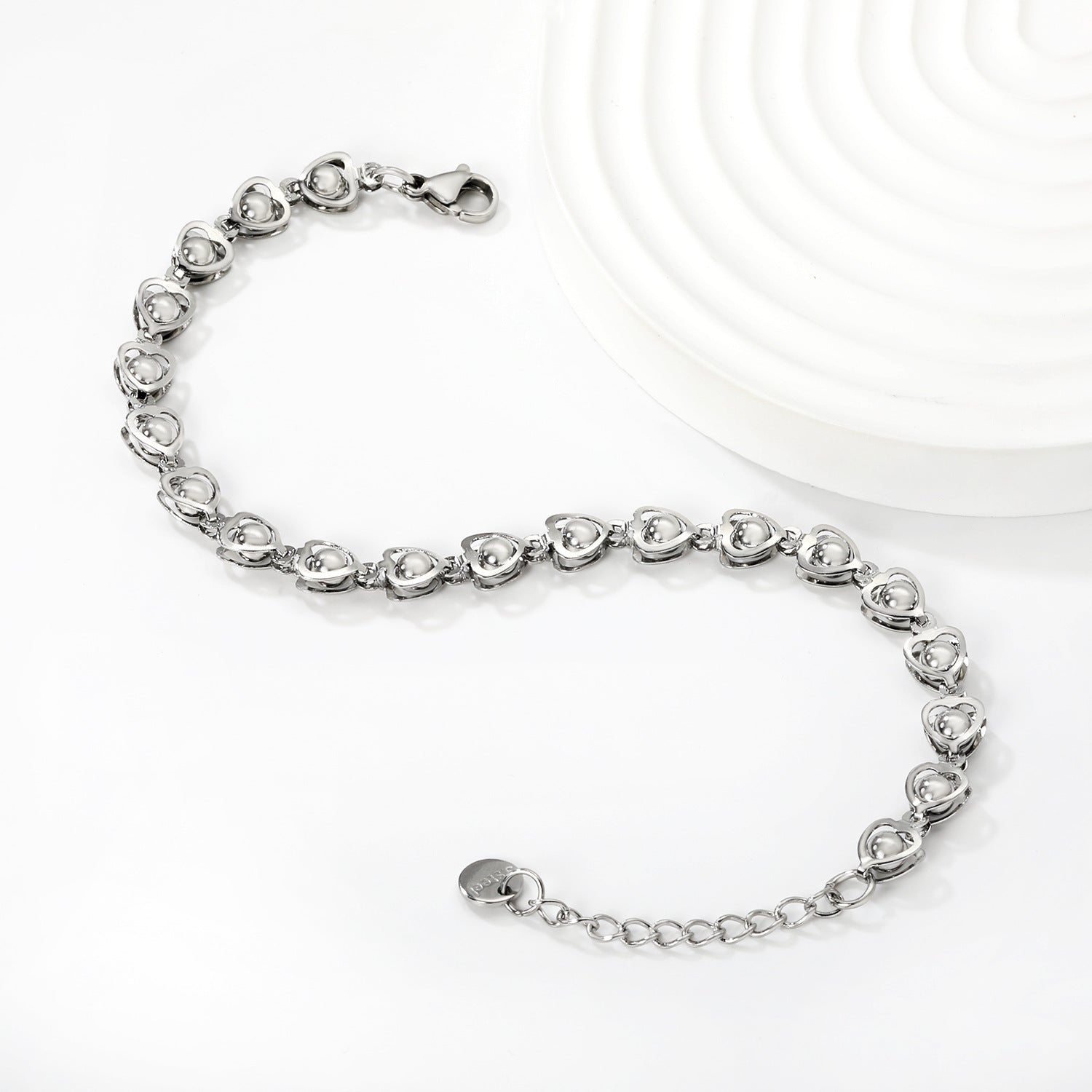 Damen Armband mit herzförmigen Anhängern und verstellbarem Verschluss Shop Nory