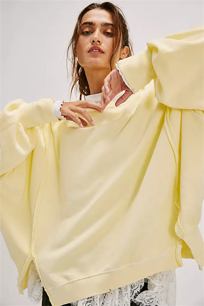 Damen oversized Sweatshirt mit Ballonärmeln, offenen Saumnähten und seitlichen Schlitzen Shop Nory