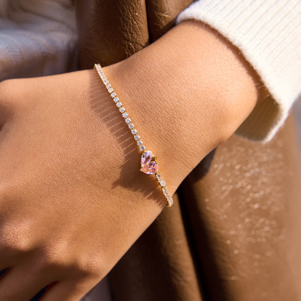 Damen Armband mit funkelnden Zirkonia und herzförmigem Anhänger Shop Nory