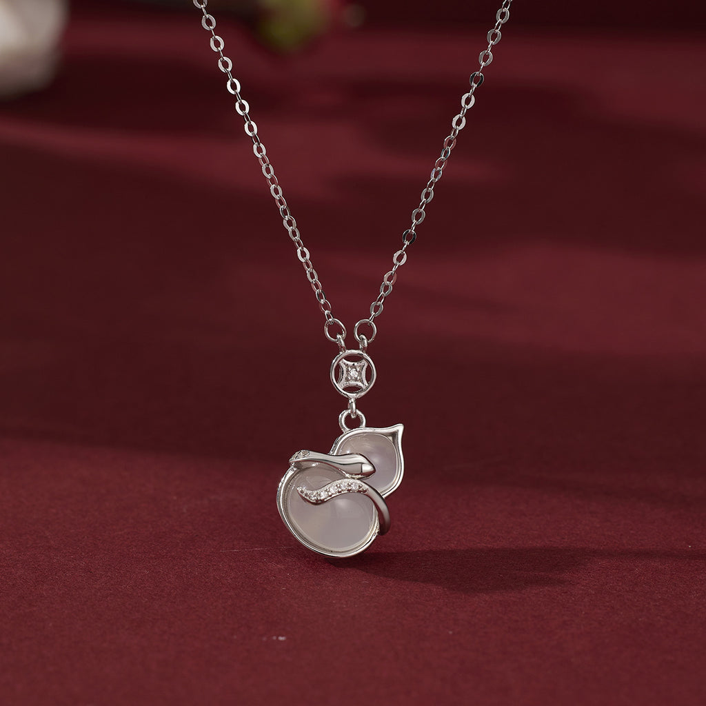Damen elegante Halskette mit kunstvollem Blatt-Design und Perlenanhänger Shop Nory