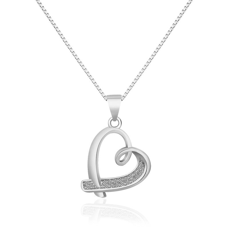 Damen Halskette mit elegantem Herzanhänger und funkelnden Zirkonia Shop Nory