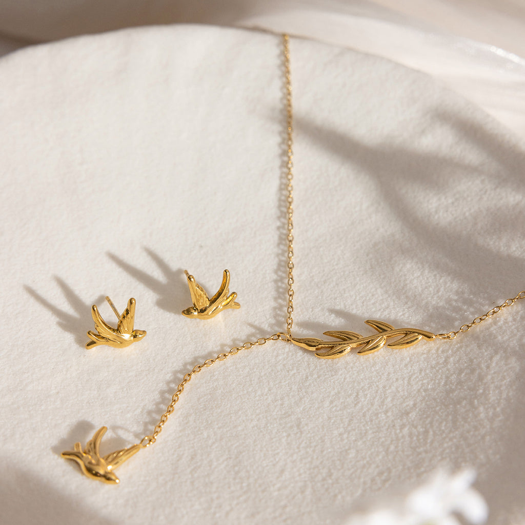 Damen Halskette mit Anhänger im eleganten Vogel-Design aus hypoallergenem Edelstahl Shop Nory